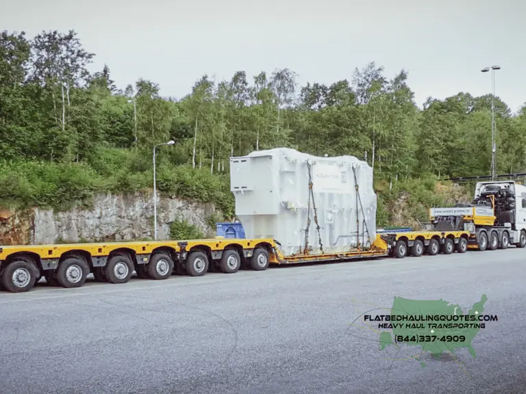 moving transformers on a flatbed trailer