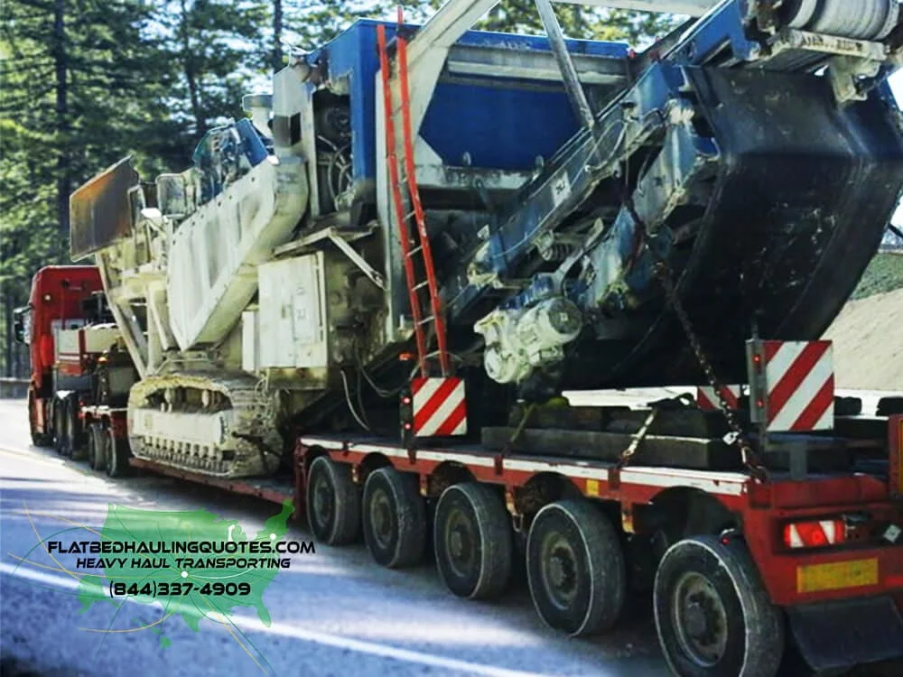 moving crushers on a flatbed trailer